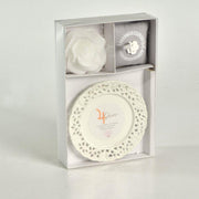 Candle w/pink saucer jupiter hellebore&flowers cm26x17h4,5 - 8 hours