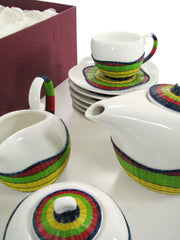 Tea cups with teapot and multicolor milk jug 9 pieces