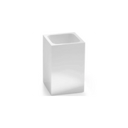 Toothbrush holder in glossy white resin.