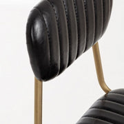 Addy modern retro chair with black leatherette steel structure