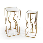 Set of two living room tables in golden metal