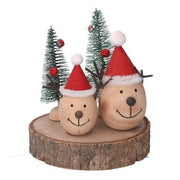 Wooden reindeer on natural trunk 14x11,5h10,5 cm