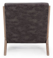 Faux leather armchair with vintage style cushion
