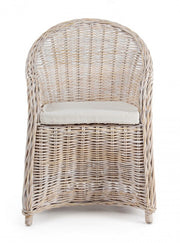 Armchair with new white cushion in natural fibers