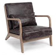 Faux leather armchair with vintage style cushion