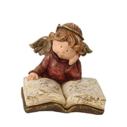 Resin angel with gold book cm19x17h15,5