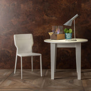 Chair in white imitation leather