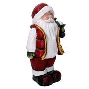 Resin Santa Claus with red tree cm28x18h42,5