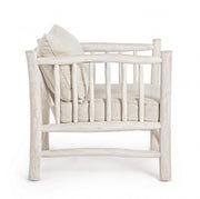 White armchair with natural style teak cushion