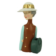 Brown resin woman with bag cm17x13h36