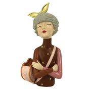 Resin woman with brown flower bag cm17x13h35