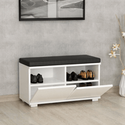 Shoe rack with black and white Dragoshoe pouffe