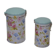 Round metal jar 1-2 light blue roses cmø12h19