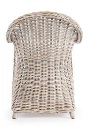 Armchair with new white cushion in natural fibers