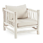 White armchair with natural style teak cushion