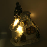 Resin house with white led tree cm26,5x17h36
