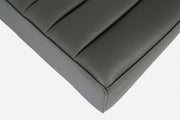 Design-style dark green ottoman in wood