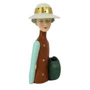 Brown resin woman with bag cm17x13h36