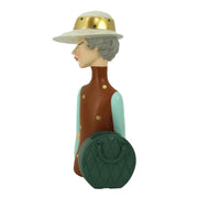 Brown resin woman with bag cm17x13h36